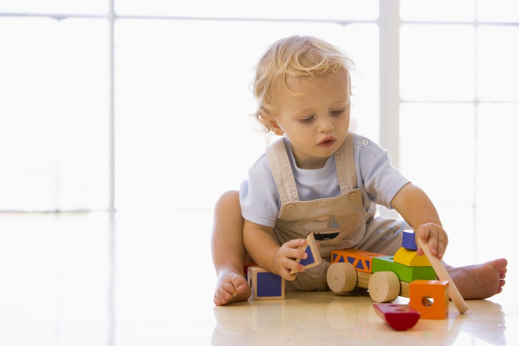 baby playing indoors